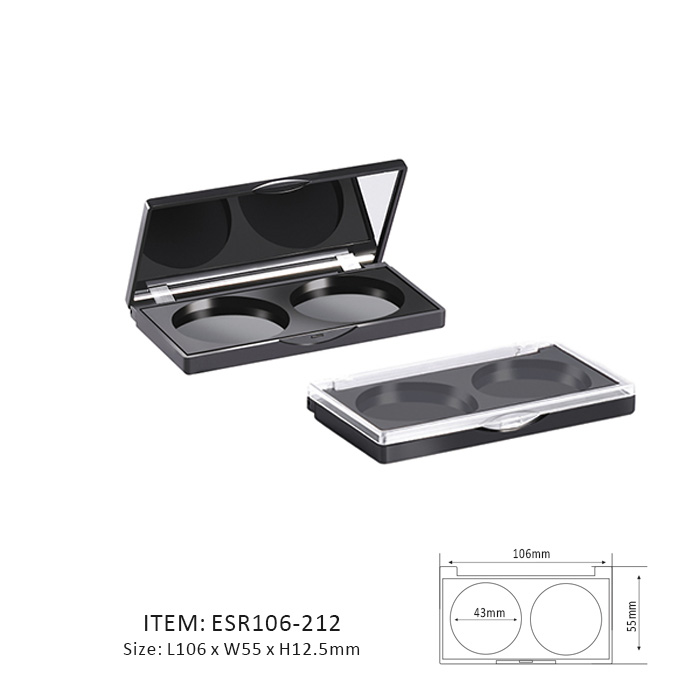 Dark Rectangular Eyeshadow Palette Containing Two Circular sections and a mirror or window on the cap