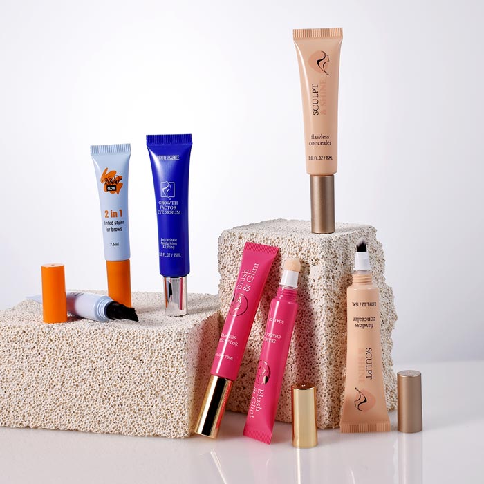 empty cosmetic squeeze tubes with applicator as packaging for cosmetic, skincare and makeup