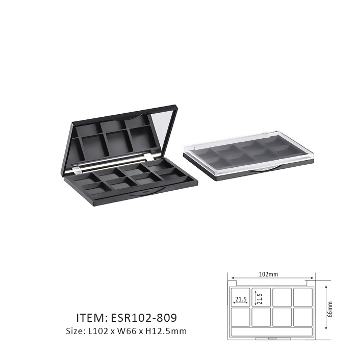 Black Rectangular Eyeshadow Palette Containing Eight Rectangular sections and a mirror or window on the cap