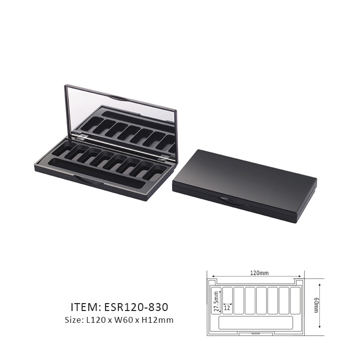 Black Delicate Eyeshadow Palette Containing Eight Vertical Sections and a mirror on the cap