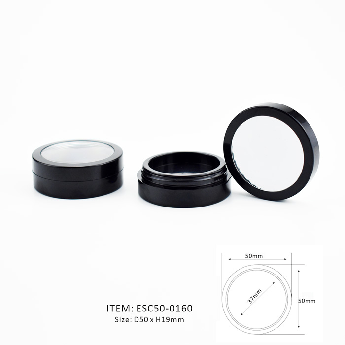 black circular eyeshadow case equipped with a transparent window